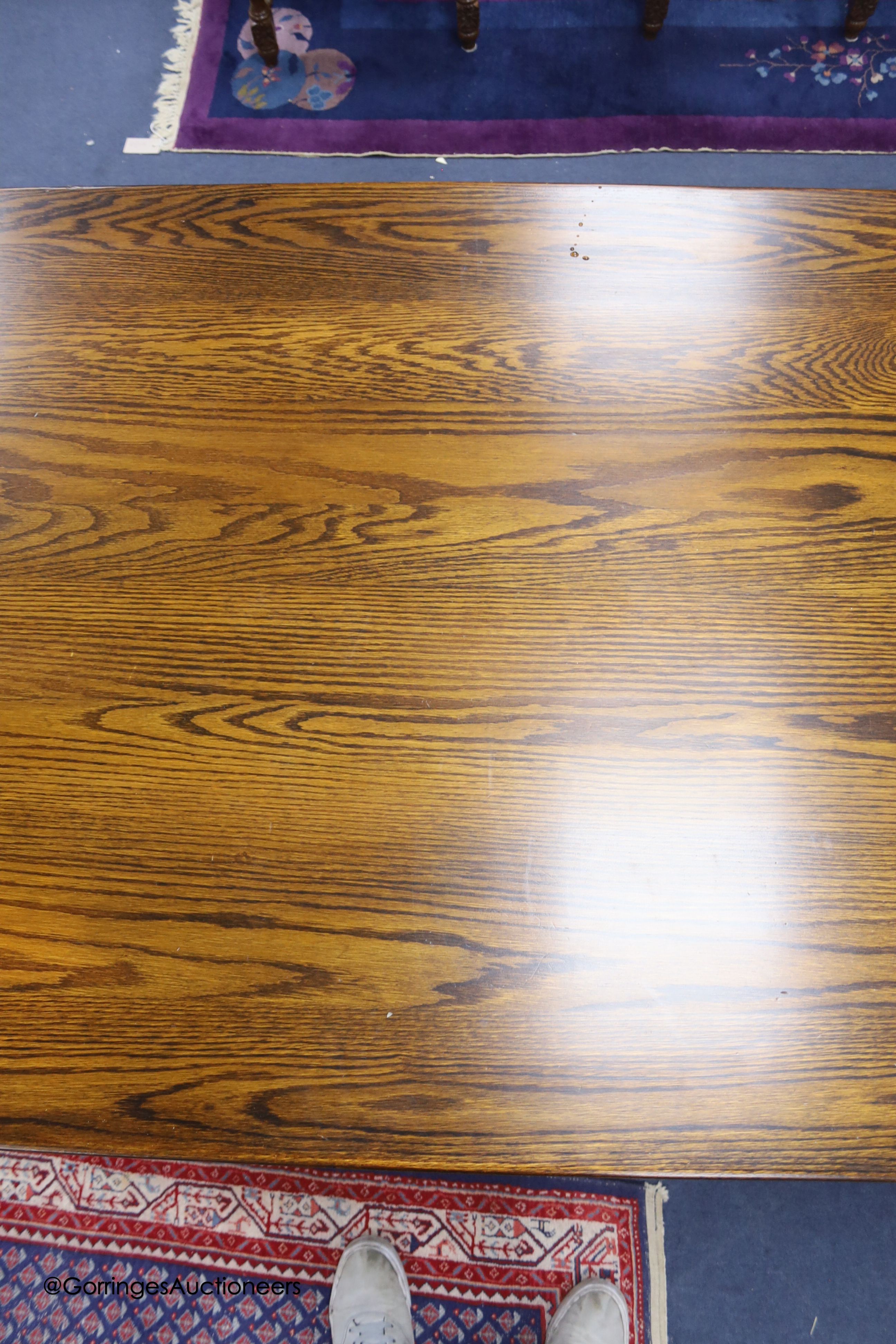 A reproduction 18th century style oak refectory table, width 310cm depth 91cm height 76cm